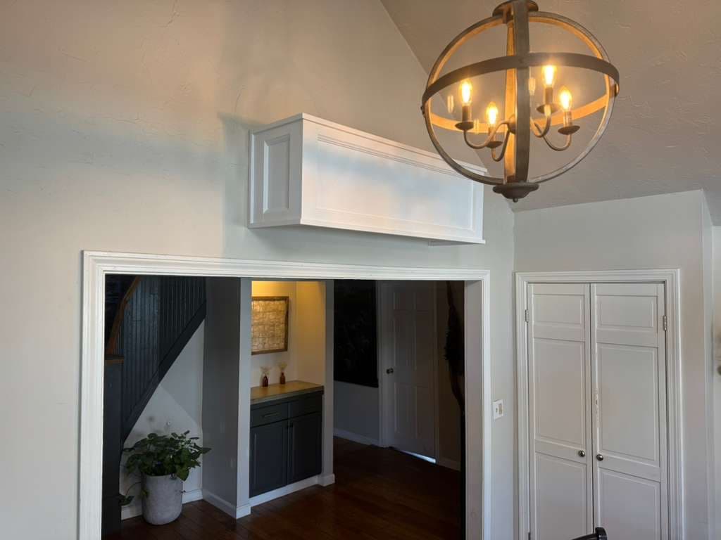 Tall mini-split cover in a foyer